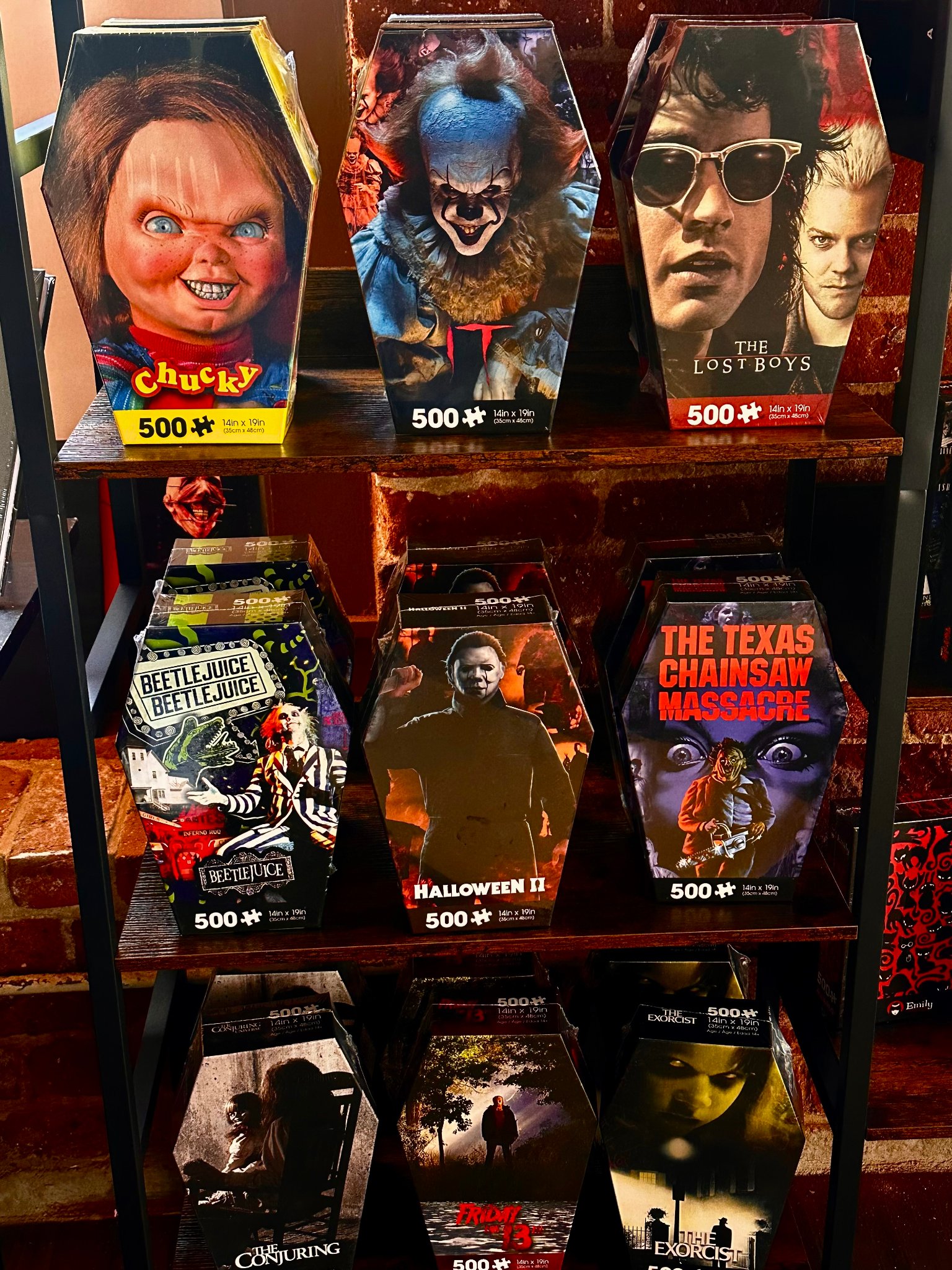 Horror coffin-box jigsaw puzzles — Chucky, IT, The Lost Boys, Halloween II, Texas Chainsaw Massacre, and more